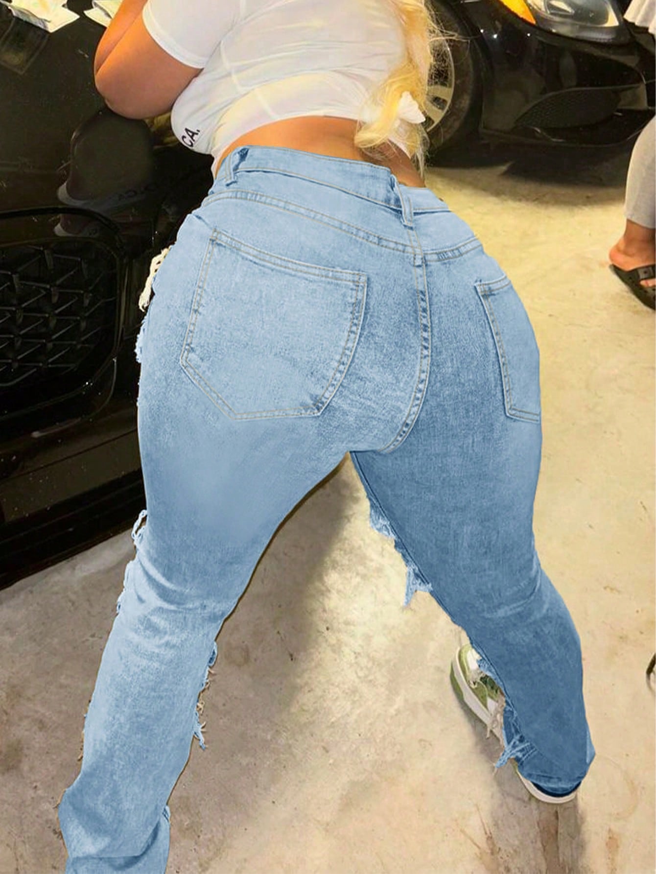 Women's Blue Heavily Distressed Shredded Fringe Jeans